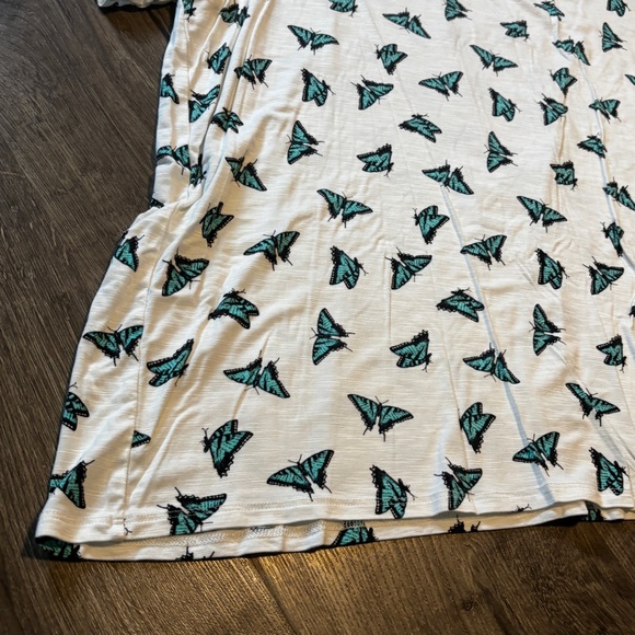 LuLaRoe Cream/White Top with Teal and Black Butterfly Design - Picture 2 of 5